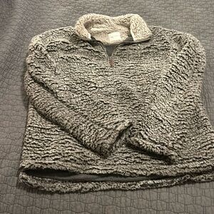 Still has life left in it. Fleece half zip. Greys and black. Sz L. Super comfy!